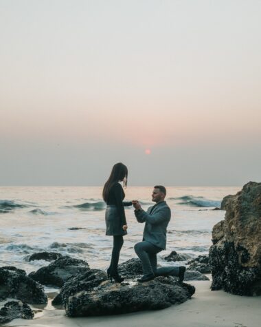 A marriage proposal shoot is a wonderful way to commemorate popping the big question. Learn how to get the perfect snaps like this man proposing on one knee to his girlfriend on a beach.
