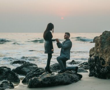 Getting down on one knee on the beach like this man is super romantic, but you need the perfect proposal photographer to get a shot of it.