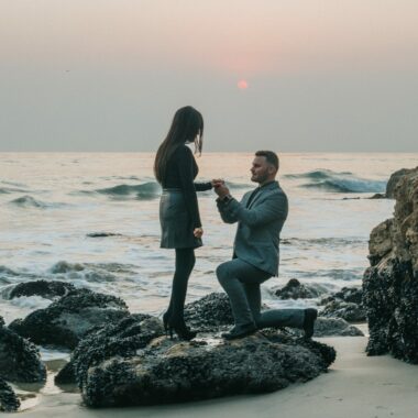 Getting down on one knee on the beach like this man is super romantic, but do you know which knee is used in a proposal? Read on to find out.