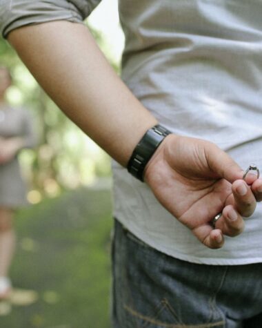 Man hiding engagement ring